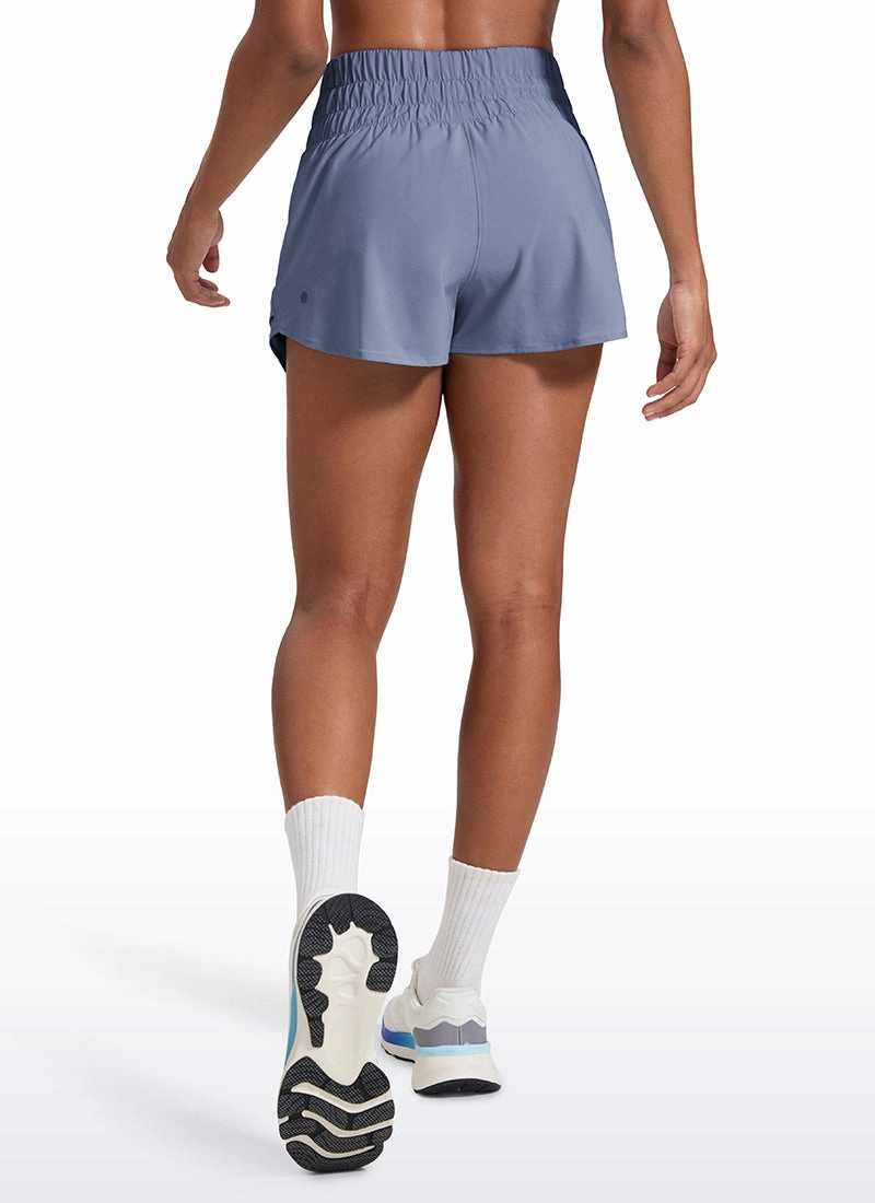 Feathery-Fit Soft High Waisted 2 in 1 Flowy Shorts with Zip Pockets